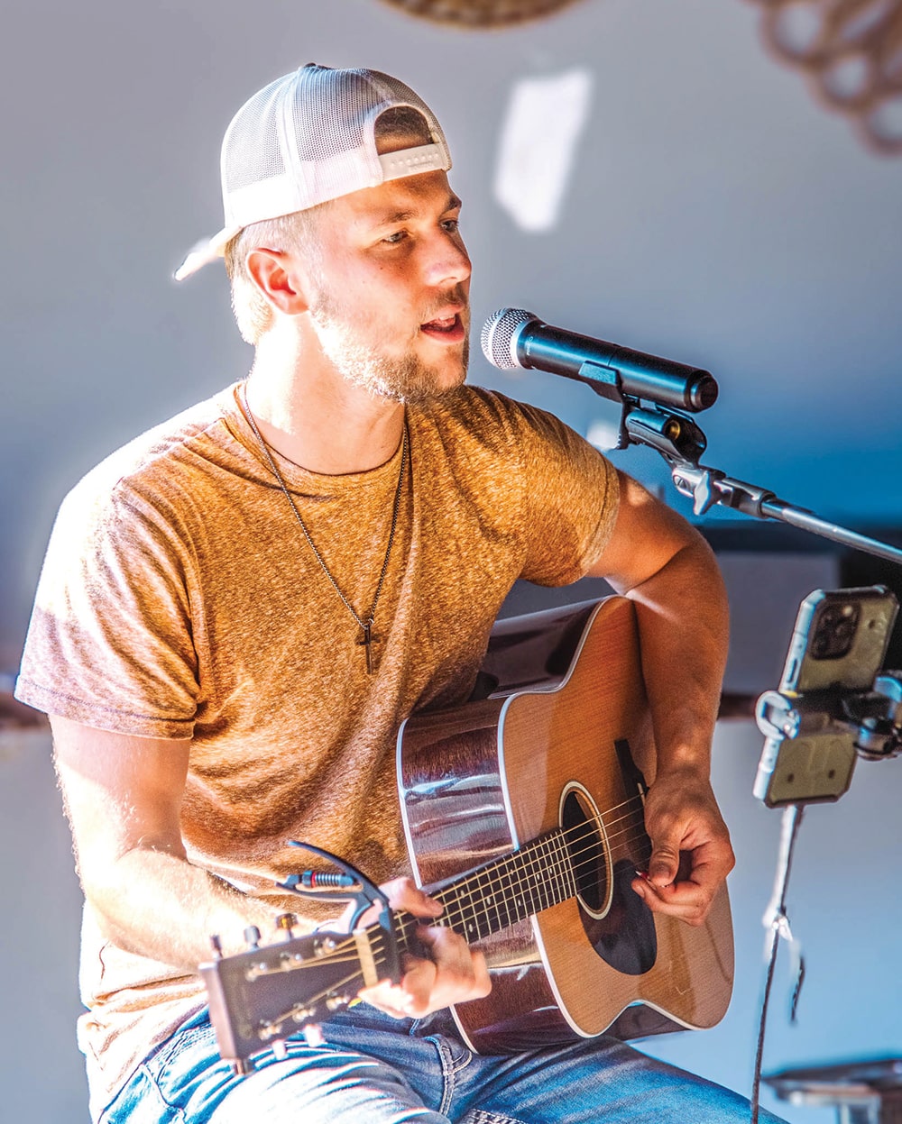 Singer Cooper Johnson playing at Boss Cider